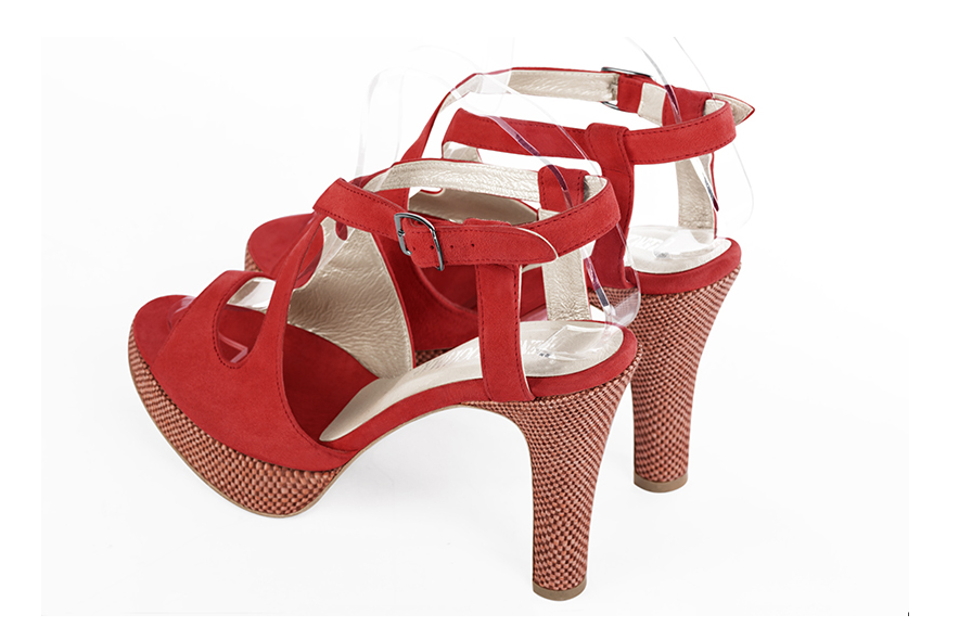 Scarlet red women's open back sandals, with crossed straps. Round toe. Very high slim heel with a platform at the front. Rear view - Florence KOOIJMAN